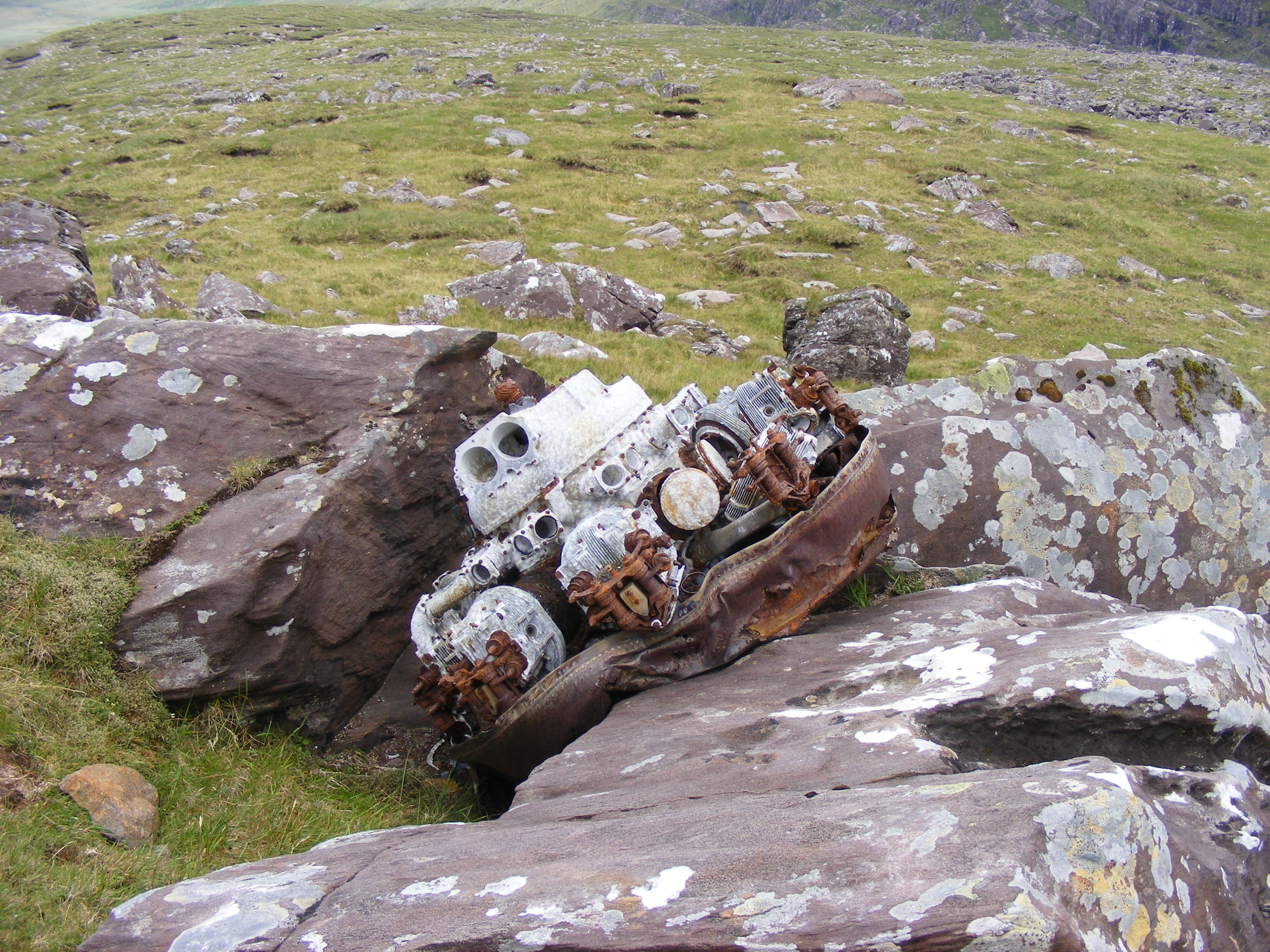 Another of G-AGES engines with front mounted
              exhaust ring, lying as it fell on a rock.